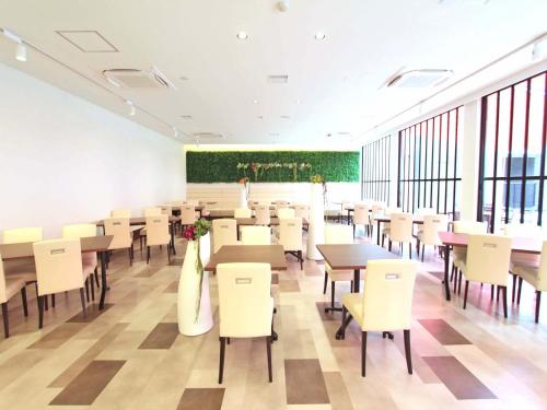 Restoranas ar kita vieta pavalgyti apgyvendinimo įstaigoje Henn na Hotel Laguna Ten Bosch