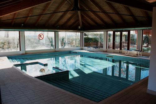 a large swimming pool in a house at Camping Venezia Village in Mestre