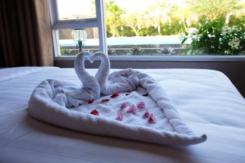 Katil atau katil-katil dalam bilik di Mexolie Hotel