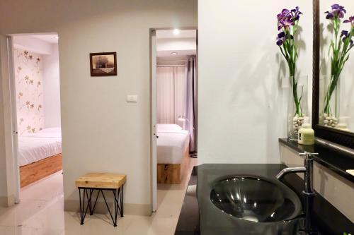 Postel nebo postele na pokoji v ubytování DewyHouse