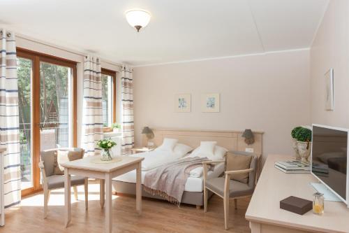 Ένα ή περισσότερα κρεβάτια σε δωμάτιο στο Villa Sosnowa