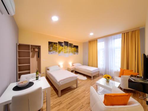 TV a/nebo společenská místnost v ubytování Apartments Postic