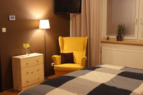 A bed or beds in a room at Ubytování U Morisse