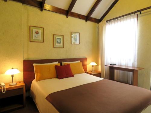 Ένα ή περισσότερα κρεβάτια σε δωμάτιο στο Hotel 5 Norte