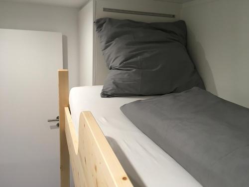 A bed or beds in a room at Ferienhaus "Haus Sommerstieg"