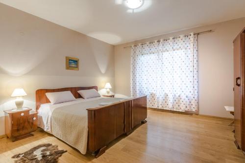 Ένα ή περισσότερα κρεβάτια σε δωμάτιο στο Apartment Jeger