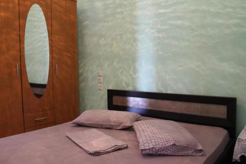 Postel nebo postele na pokoji v ubytování Apartments Spiros Pelion