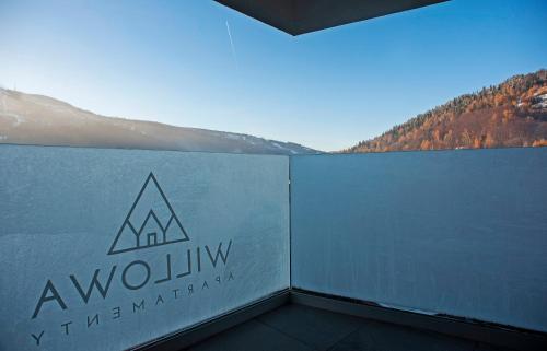 a room with a view of a mountain at Apartamenty Willowa in Szczyrk