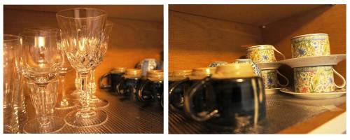 two pictures of wine glasses on a table at Lucy's House横浜中華街 House3 in Yokohama