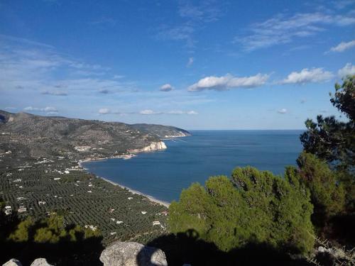 a view of the ocean from a hill at Casa MARESOLE in Mattinata