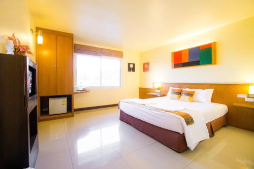Ένα ή περισσότερα κρεβάτια σε δωμάτιο στο The Lephant Hotel