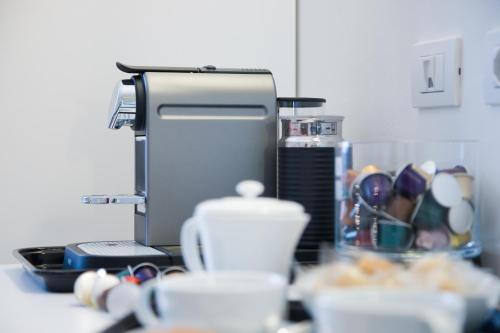 a kitchen counter with a printer on a counter at Viasparano B&B in Bari