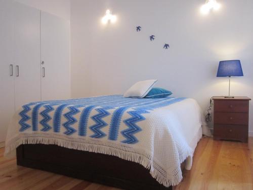 Ένα ή περισσότερα κρεβάτια σε δωμάτιο στο Casa Zé Bonito 2