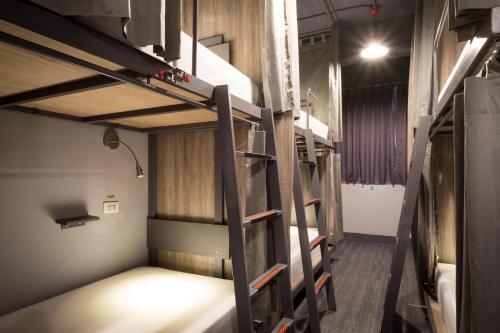Palanda nebo palandy na pokoji v ubytování Taipei Travelers International Hostel