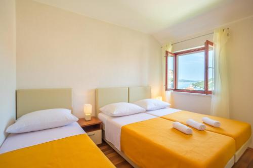 Posteľ alebo postele v izbe v ubytovaní Niki Apartment