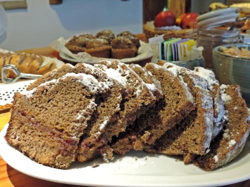 a slice of cake on a plate on a table at Hosteria El Hoyo in El Hoyo