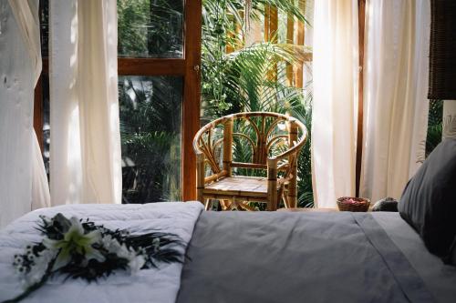 Katil atau katil-katil dalam bilik di Mamasan Treehouses & Cabins