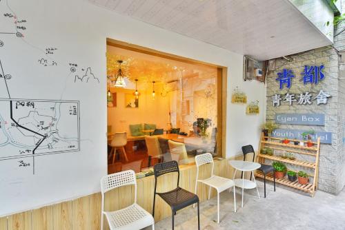 Uma área de estar em Guilin Cyan Box Guest House