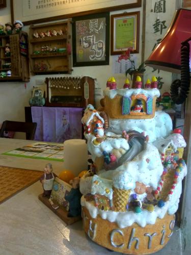a cake with a train on top of it at 池上5159懷舊民宿 請勿用阿勾達訂房 in Chishang