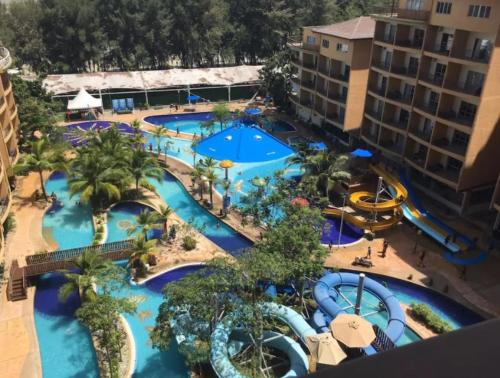 an overhead view of a large swimming pool at a resort at Studio Apartment @ Gold Coast Morib Banting Malaysia in Morib
