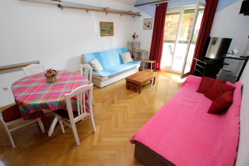 Postel nebo postele na pokoji v ubytování Apartment Toma