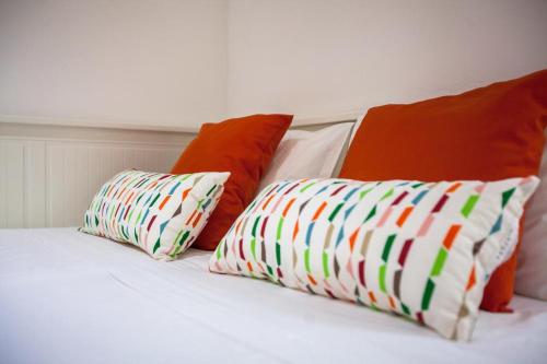 Łóżko lub łóżka w pokoju w obiekcie Lisbon City Sweet Studio