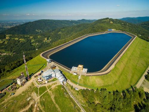 an aerial view of a lake on a hill at Willa Aleksandra - Apartamenty in Międzybrodzie Żywieckie
