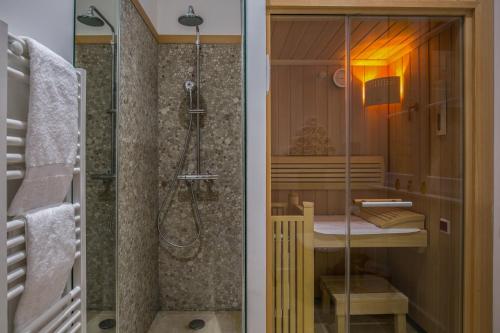 two pictures of a bathroom with a shower and a sink at Villa Reale in Bordeaux