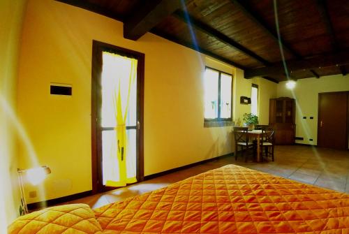 Ένα ή περισσότερα κρεβάτια σε δωμάτιο στο Agriturismo di Sordiglio