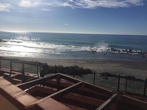 a view of the beach from the balcony of a condo at Il terrazzino di Lulù in Cetraro
