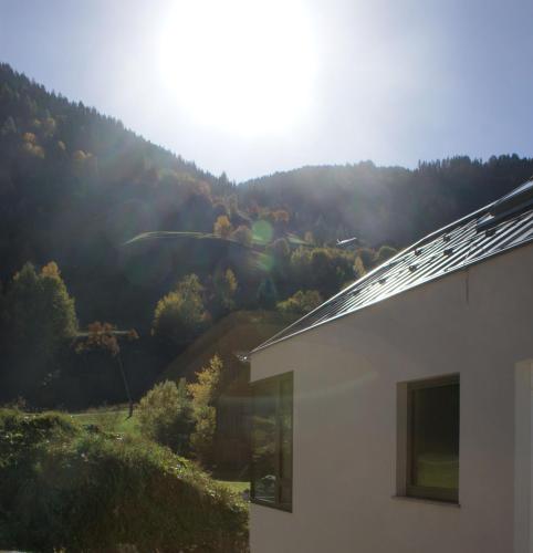 a house with a view of a mountain at Laudinella - Apart in See