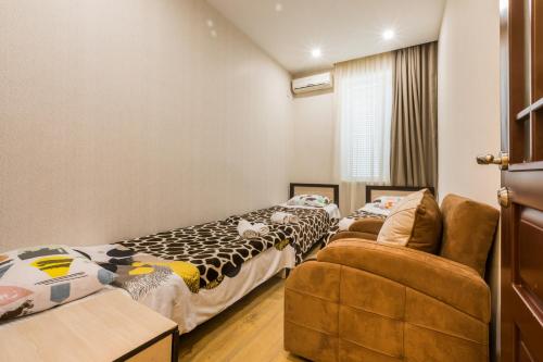 מיטה או מיטות בחדר ב-Sweet Home Apartment VIP 1