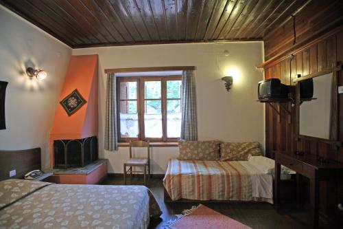 Postel nebo postele na pokoji v ubytování Hotel Galaxias