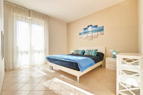 Ένα ή περισσότερα κρεβάτια σε δωμάτιο στο Appartamento Laura