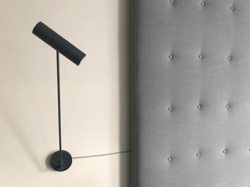 a closet with a black light on the wall at Design Hotel 36 in Sofia