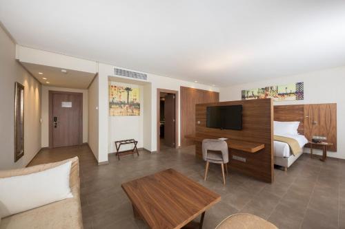 Be Live Experience Marrakech Palmeraie - All Inclusiveにあるテレビまたはエンターテインメントセンター