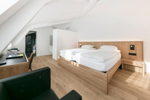 מיטה או מיטות בחדר ב-ABC Swiss Quality Hotel