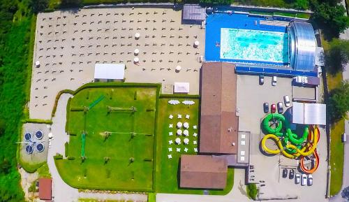 an overhead view of a building with a swimming pool at Residence Carl&Do in Baveno