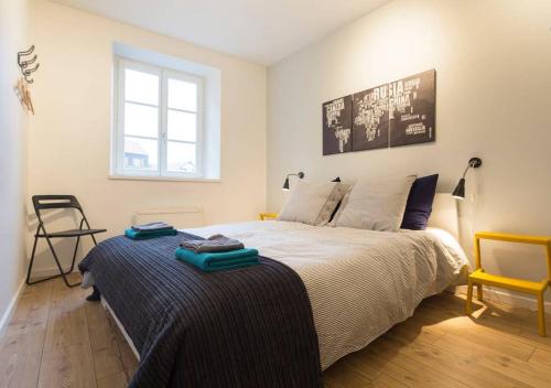 Säng eller sängar i ett rum på At home in the center of Colmar