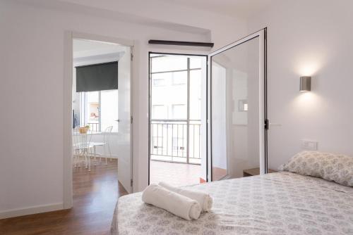 Cama o camas de una habitación en Apartamento Muñoz Torrero