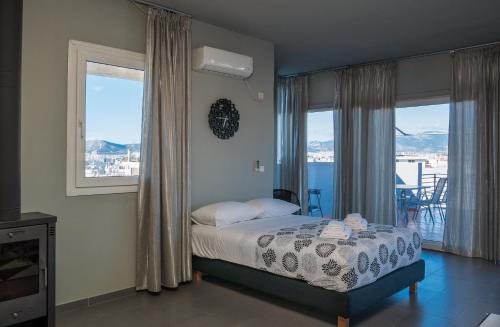 Posteľ alebo postele v izbe v ubytovaní Virgo - Loft with Spectacular View to Acropolis