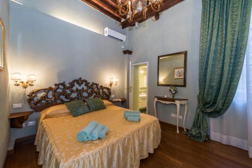 เตียงในห้องที่ Appartamento San Michele