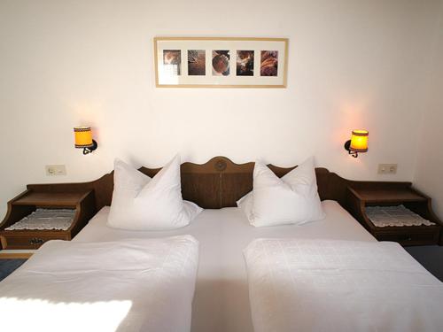 Ένα ή περισσότερα κρεβάτια σε δωμάτιο στο Apartments Auenheim
