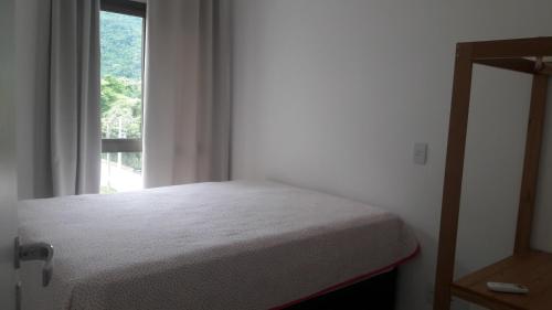 Postel nebo postele na pokoji v ubytování Um cantinho de sossego em Itacuruçá