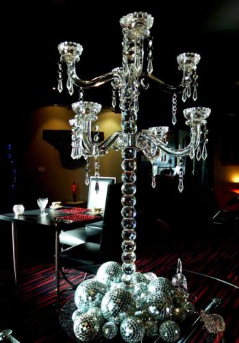 a silver chandelier in a room with a table at The Retreat at Froog Moore Park in Tamworth
