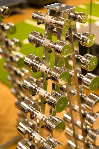 a bunch of wine bottles lined up in a row at CORTIINA Hotel in Munich