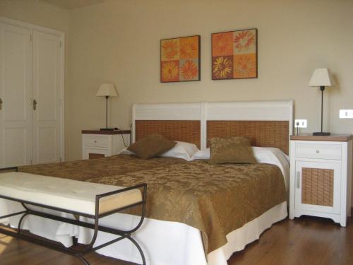 Katil atau katil-katil dalam bilik di Apartamentos Bruja