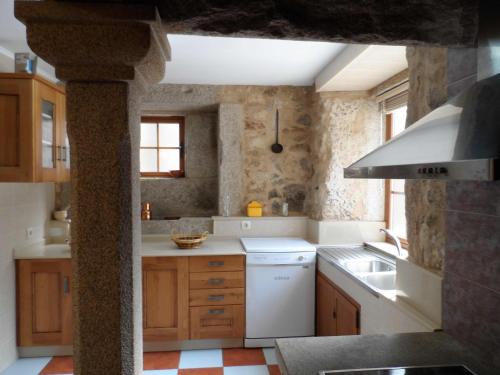 Kuchyň nebo kuchyňský kout v ubytování Casa Barqueiro