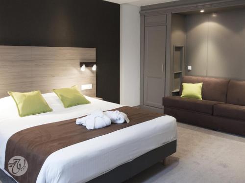 Hotel Restaurant & Spa Verte Valléeにあるベッド