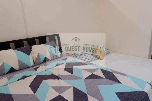 Cama o camas de una habitación en The Guest House